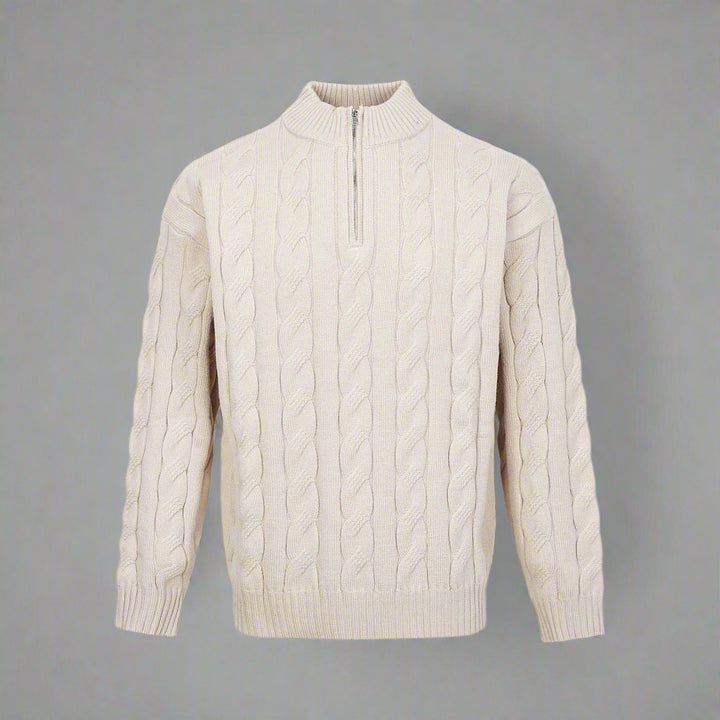 Beige cable knit sweater with a quarter zip on a white background