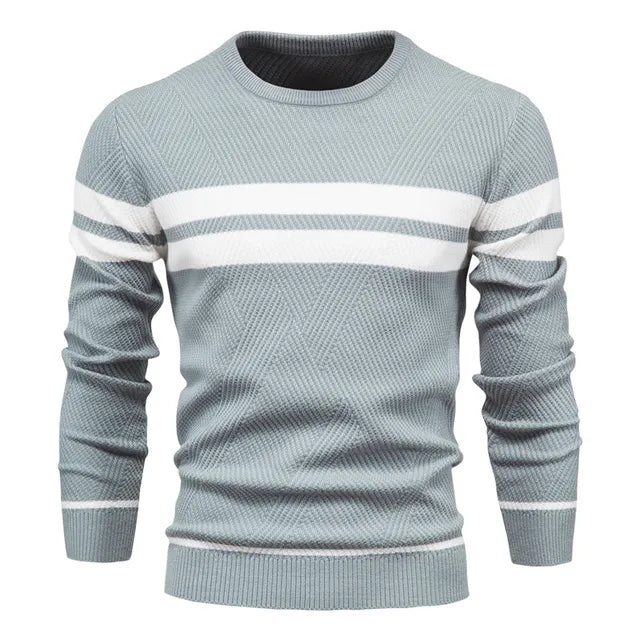 Light blue sweater with white stripes on a white background