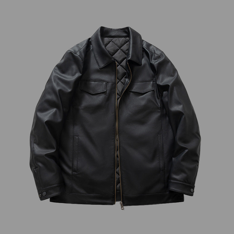 Black leather jacket on a gray background
