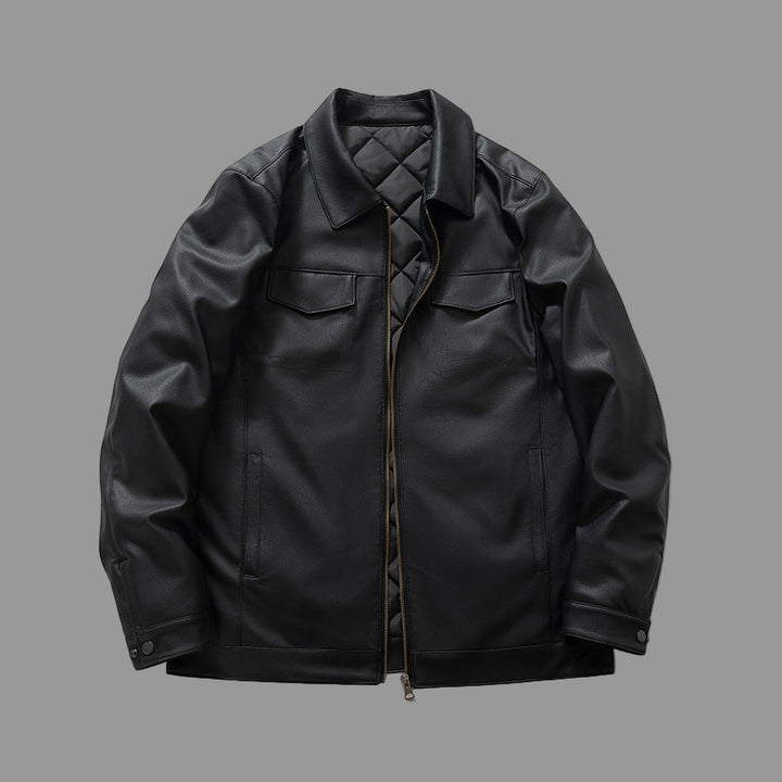 Black leather jacket on a gray background