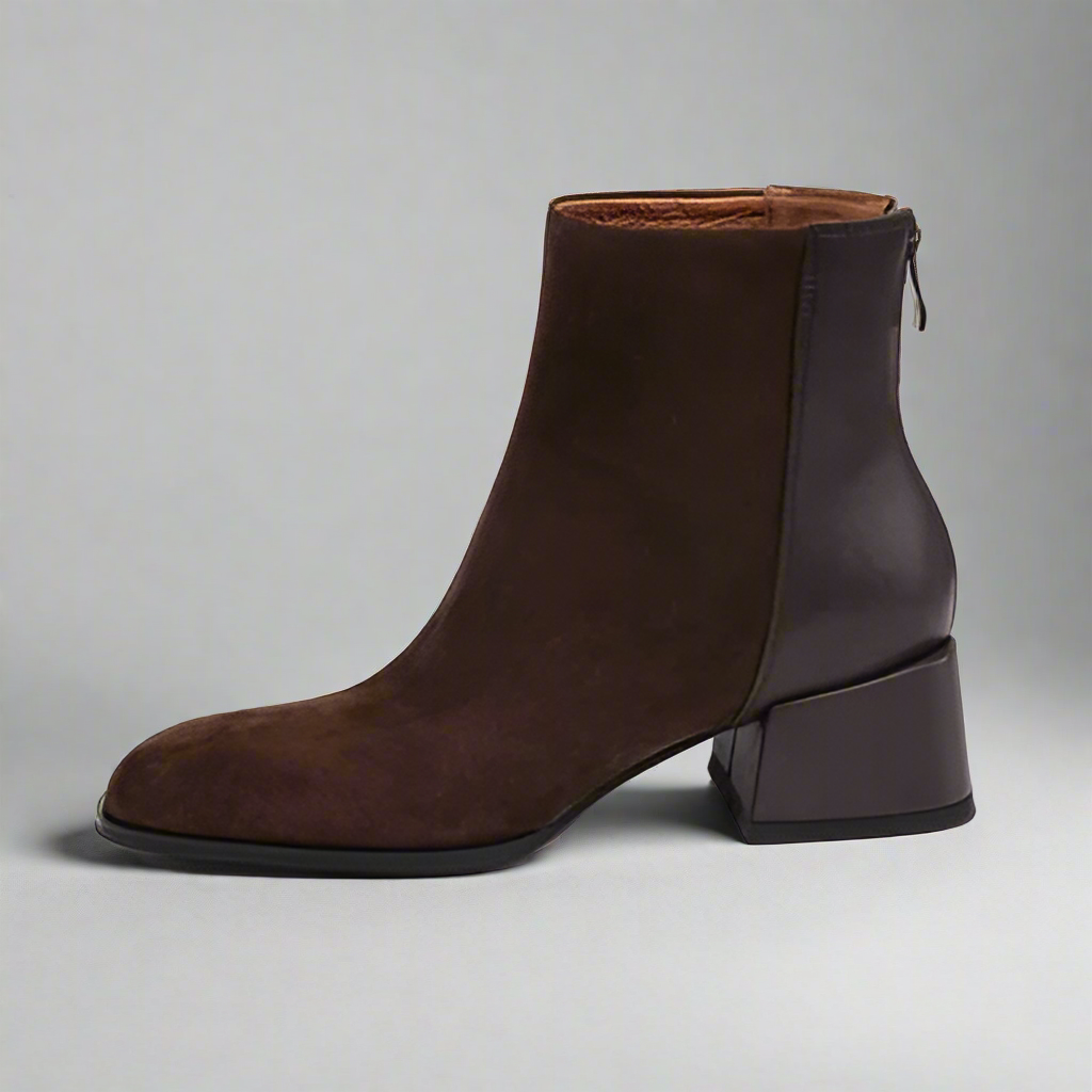 Brown ankle boot on a white background