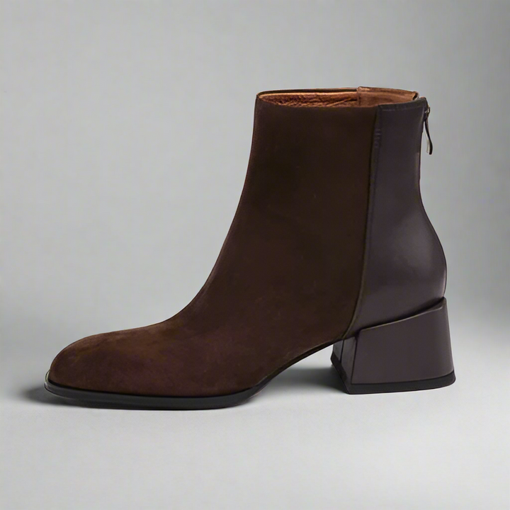 Brown ankle boot on a white background