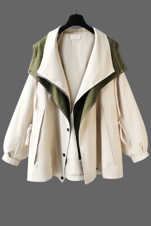 Beige jacket with green accents on a hanger against a light gray background