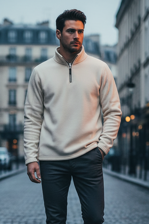 Man walking on a cobblestone street in an urban setting