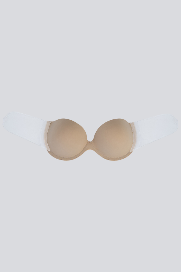 Beige strapless bra on a white background