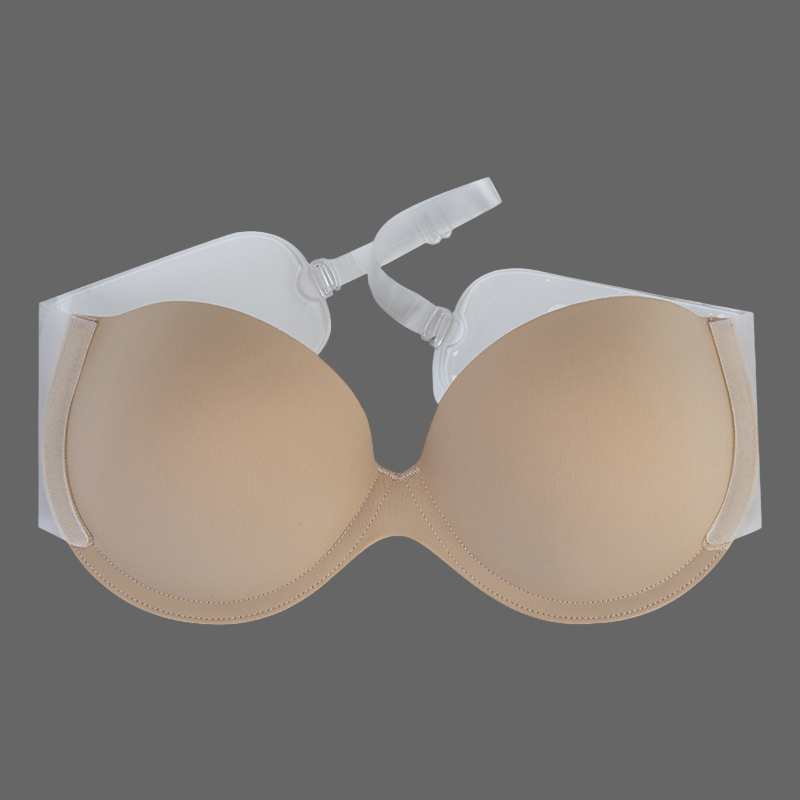 Beige strapless bra on a white background